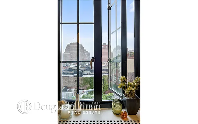 Sold by Douglas Elliman | media 17