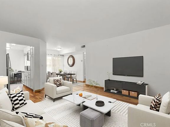Living Room and dining room in back