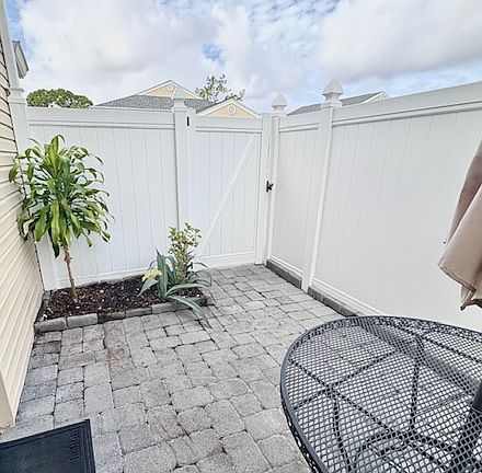Fully Fenced In Paved and Private Patio with Herb Garden.