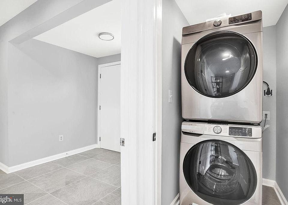 New front-load washer/dryer. Shared laundry room with owner-occupants.