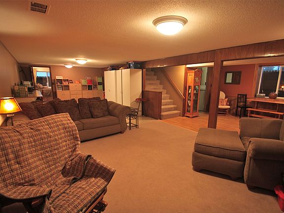 The lower level is well lit with egress windows and large open spaces