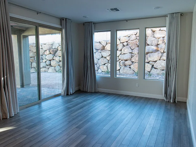 Dining room entering onto cover patio and backyard..