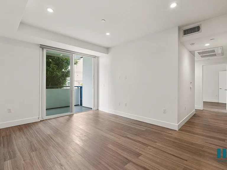 Living Room Vinyl Flooring, Recessed Lighting, and Patio
