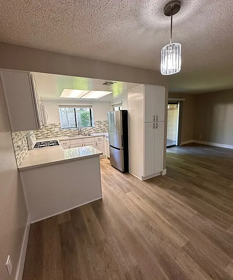 Dining room view into kitchen