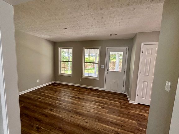 Dining room with your choice of hanging table light to be added by us.