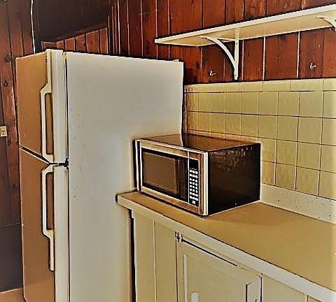 Kitchen with microwave