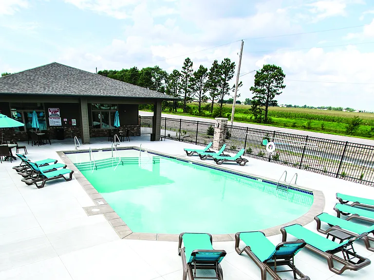 Fenced in lxury community pool at The Sterling Grand Island.