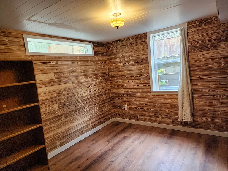 smaller of 2-room basement suite