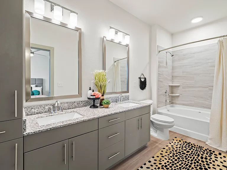 Dual Vanity Sinks and Garden Tubs