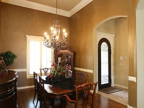 Wood Flooring & Chair Railing with Arch Entryways
