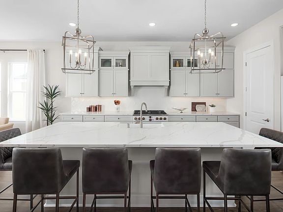 Kitchen with quartz island and countertops
