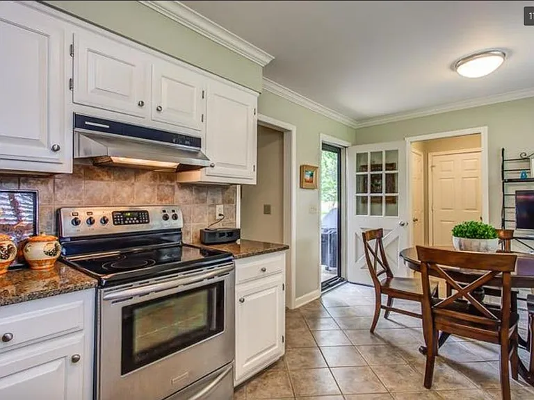 Kitchen (prior to installing new countertops and new appliances)