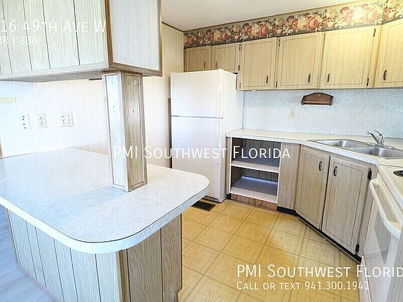 5th image of 716 49th Ave W