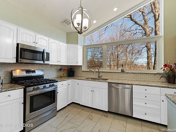 5th image of 6705 N Kostner Ave