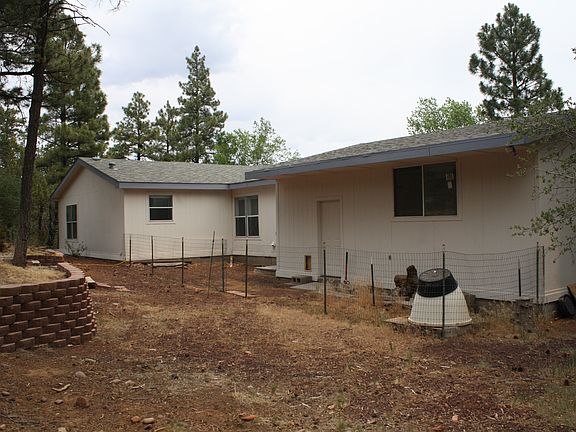 Back of garage and house.