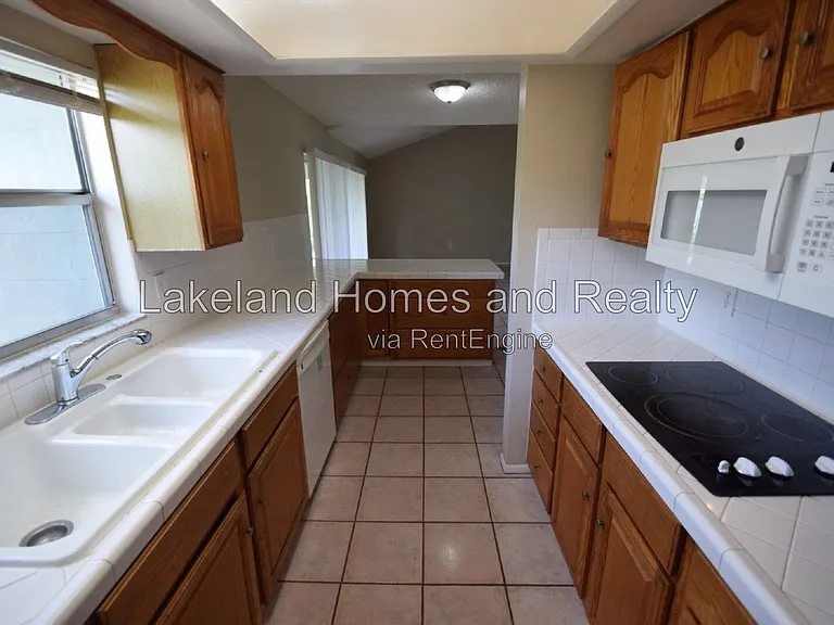 1204 Honeytree Ln W — Photo 34