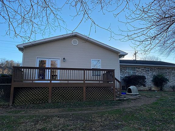 Deck with fenced in yard