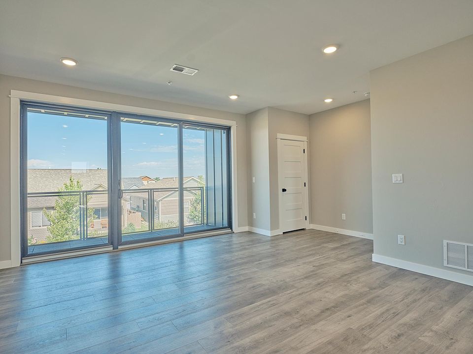 Spacious great room with large balcony.
