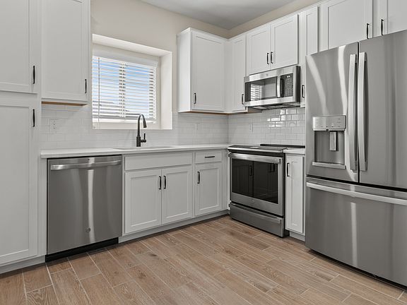 Kitchen with stainless steel appliances