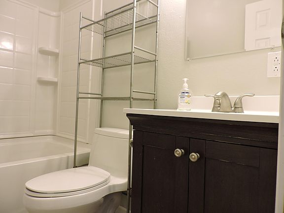 Bathroom with tub/shower.