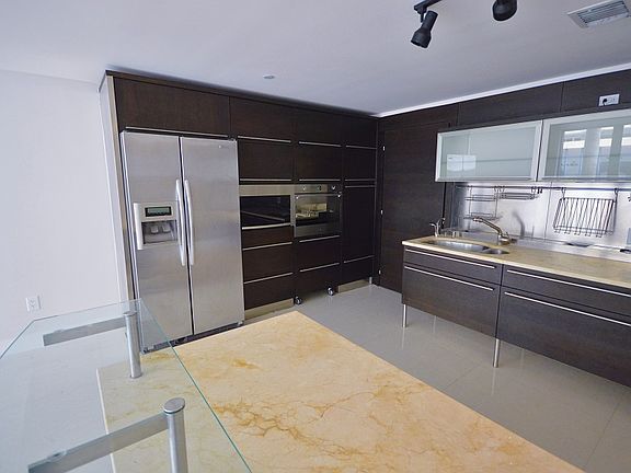 5th image of 6000 Collins Ave APT 318