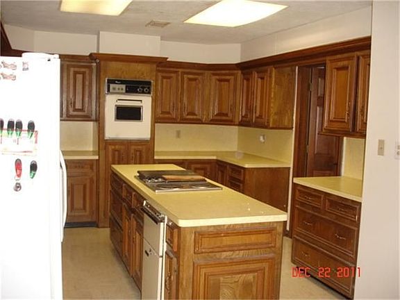 Kitchen has lots of cabinets