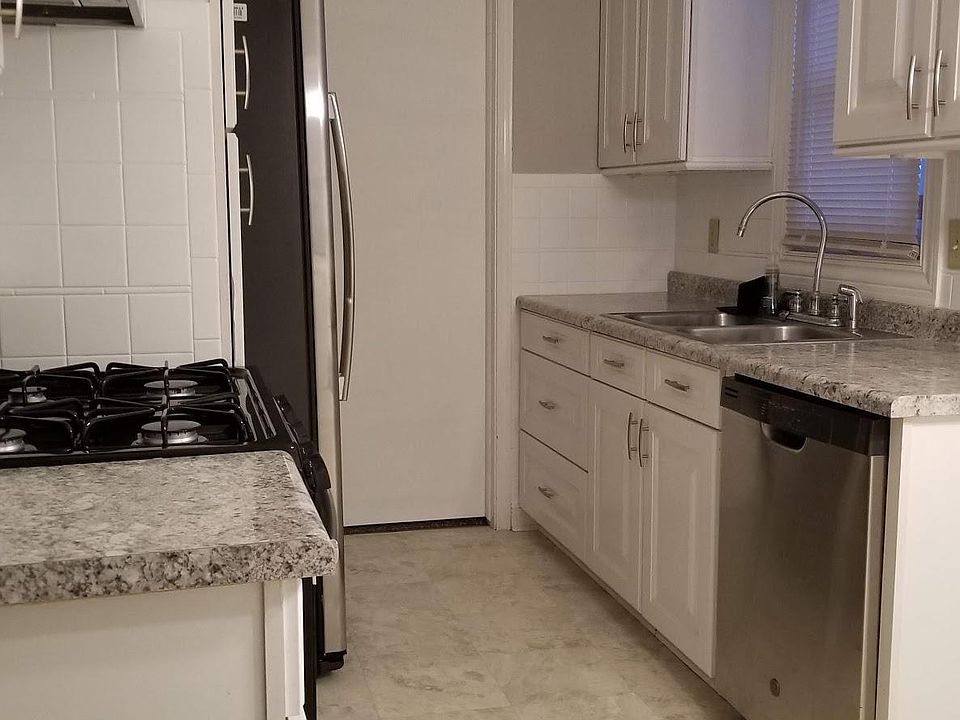 Updated kitchen with newer stainless steel appliances.
