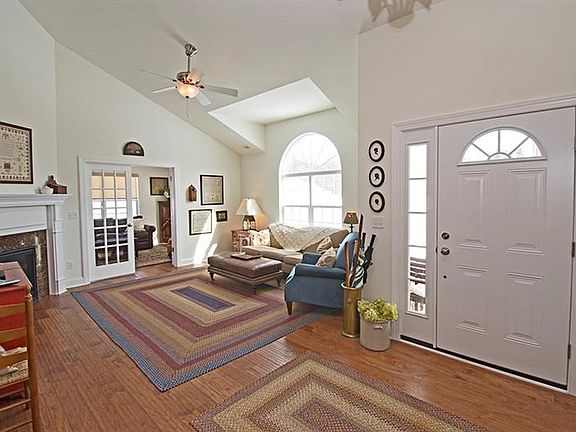Foyer and Living Room with gorgeous hardwoods.