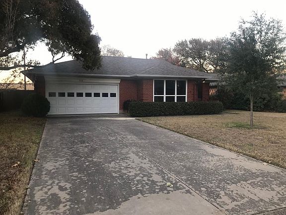 Driveway has been power washed since this picture was taken.