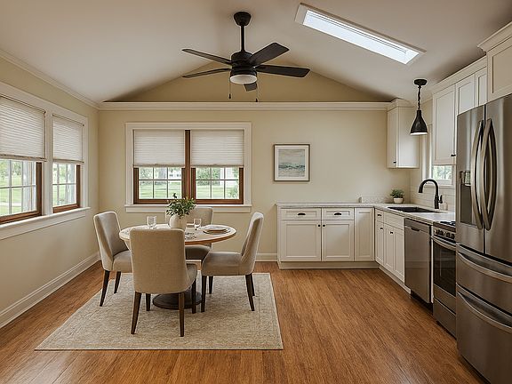 Kitchen. Staged to help illustrate potential use and scale of space.