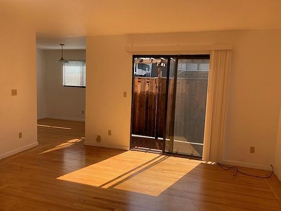 Living room looking to patio and dining room