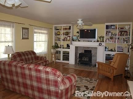 Living Room with Wood Burning Stove
						:
						Large Living Room with Jotul Wood Stove