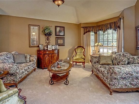 Formal dining room with bay window