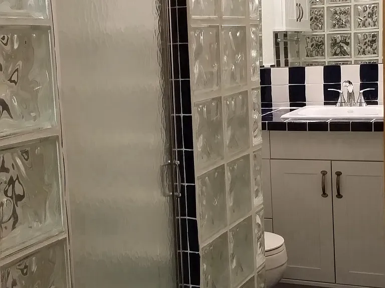 Bathroom with the old shower before the remodel