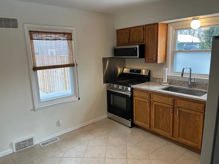 Brand new stainless steel appliances with granite countertops
