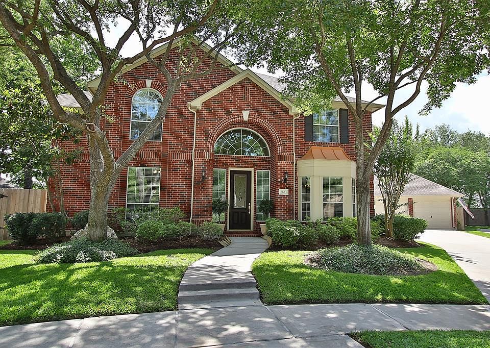 Timeless Traditional Trendmaker Home with 3 Car Garage Beautifully Situated on a 10,466 SF Cul-de-Sac Lot in the Upscale Neighborhood of Woodwind Lakes.