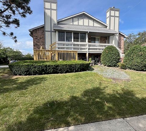 Side of the house with a new deck