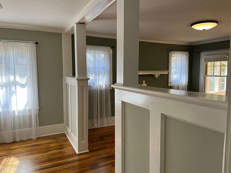 Half wall between living room and dining room.