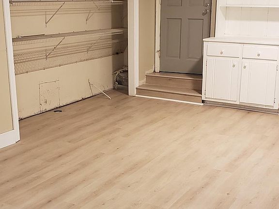 Main room, looking toward door to garage.