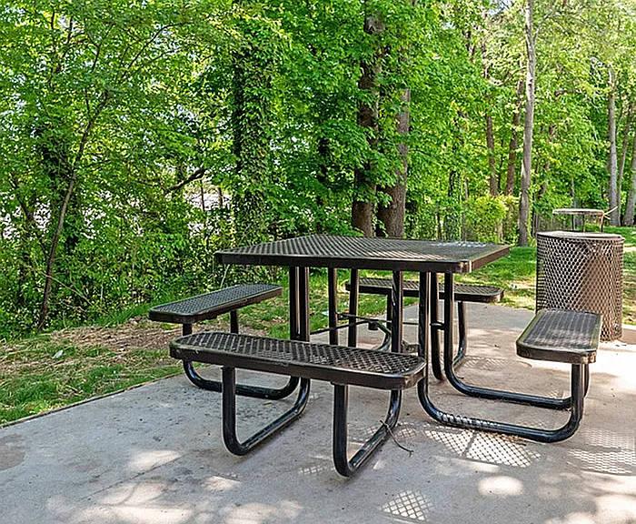 Relax in this tranquil outdoor setting, perfect for picnics and enjoying nature.