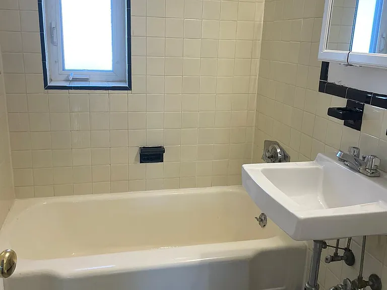 Bathroom with great tub and period tiles.