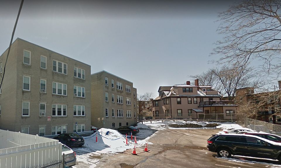 Rear of Building & Parking Lot off Wilson Park