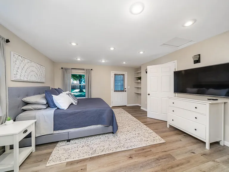 Primary bedroom with attached bath and 2 walk-in closets!
