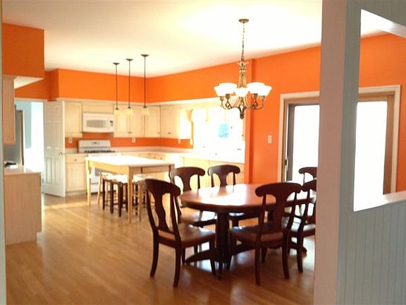 Kitchen, dining area & back patio door