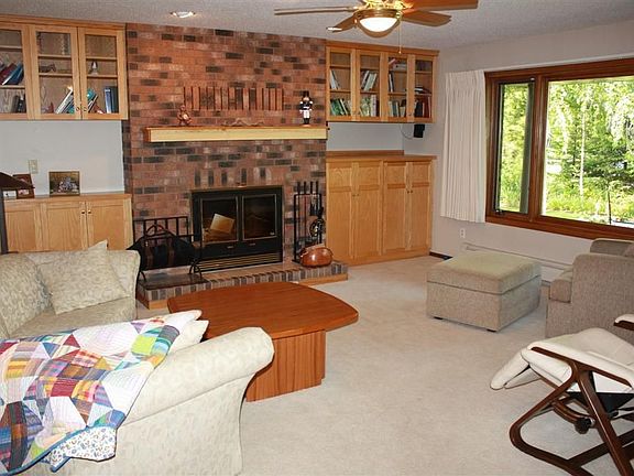 Spacious, yet cozy main floor family room with wood stove insert
