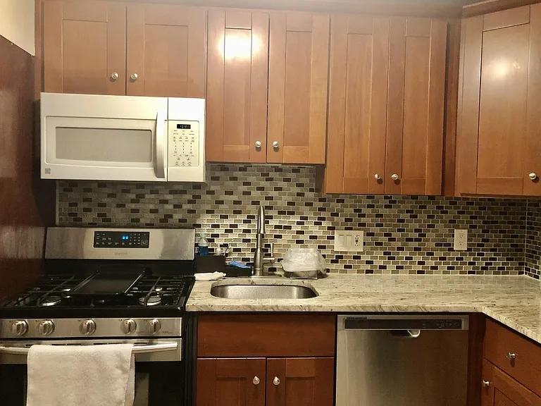 Kitchen with stainless steel appliances and granite countertops