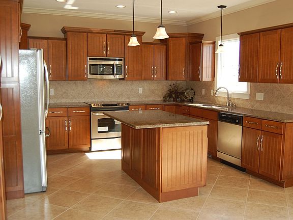 SS Appliances & Granite Tops