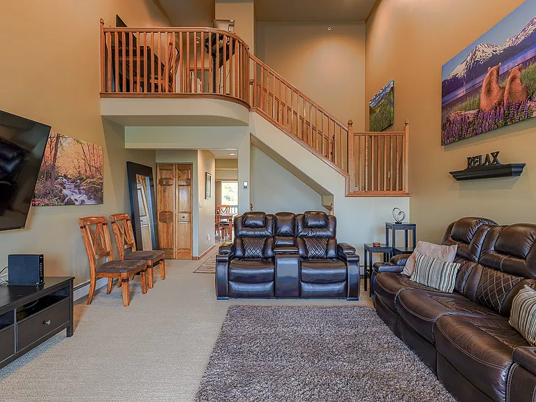 Living room on middle level and office alcove on third level