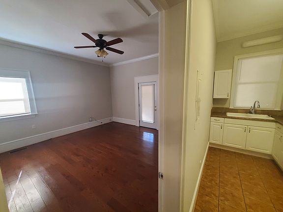 Split view of living room and kitchen