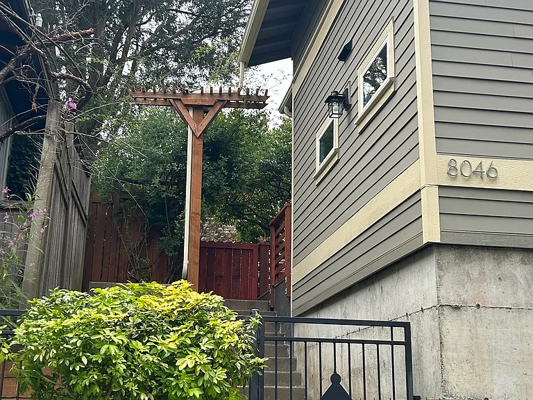 Private locked entrance to front door from alley.